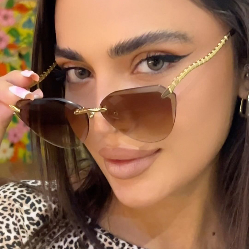 Snake leg frameless cut cat eye sunglasses, fashionable spicy girl sun protection sunglasses for women - Image 3
